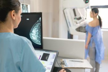 woman getting a mammogram