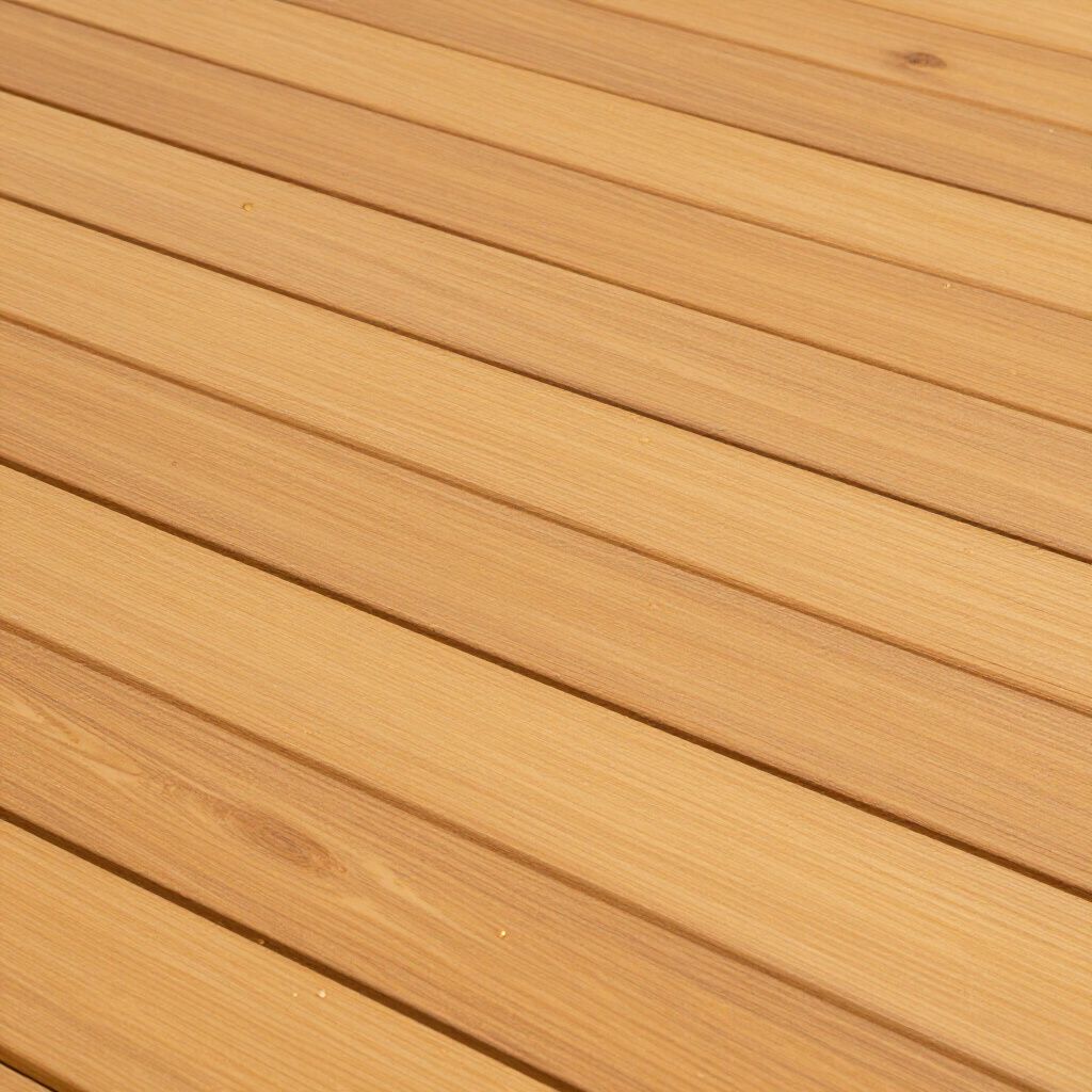 Wooden planks, parallel and diagonally oriented, with a light brown color and visible wood grain.