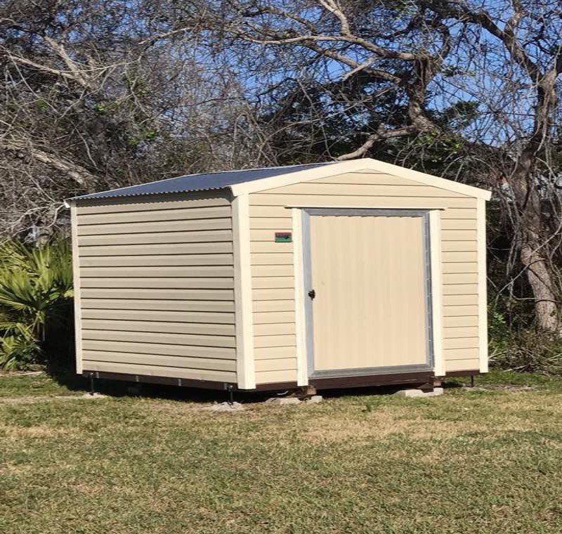 Portable Storage Shed — A Mini Storage House Under The Tree in Augustine, FL