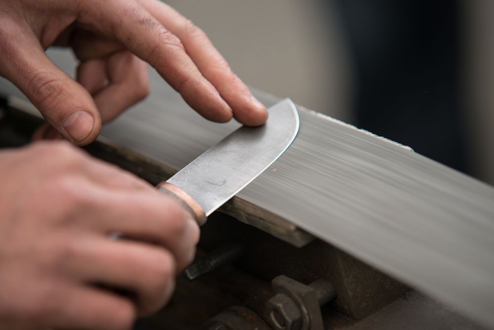 Master Man Sharpens the Knife — Mobile Scissor Sharpening in Gympie, QLD