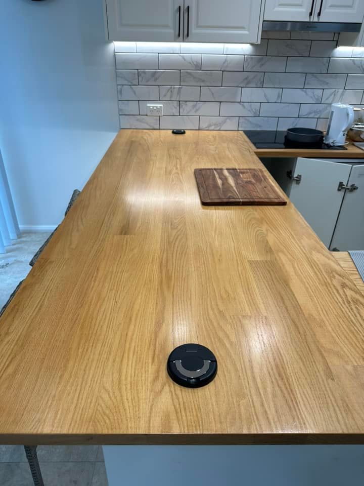 Wood Table Top — Kawungan, QLD — Electricians@Work