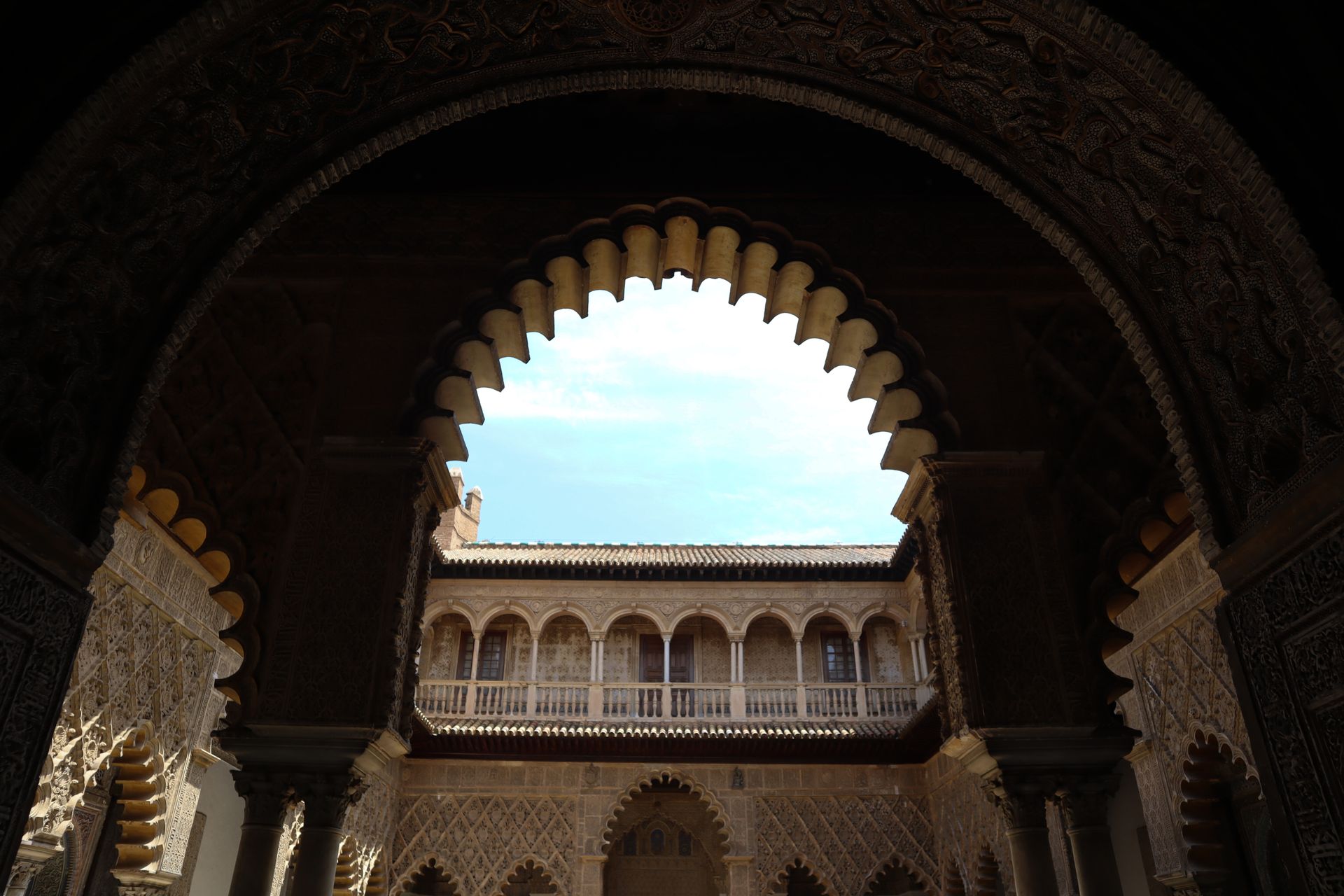 It is a very large room with a very ornate ceiling.