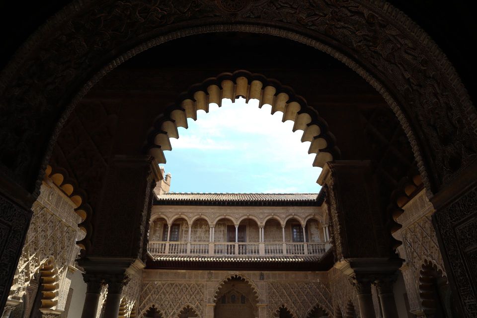 It is a very large room with a very ornate ceiling.