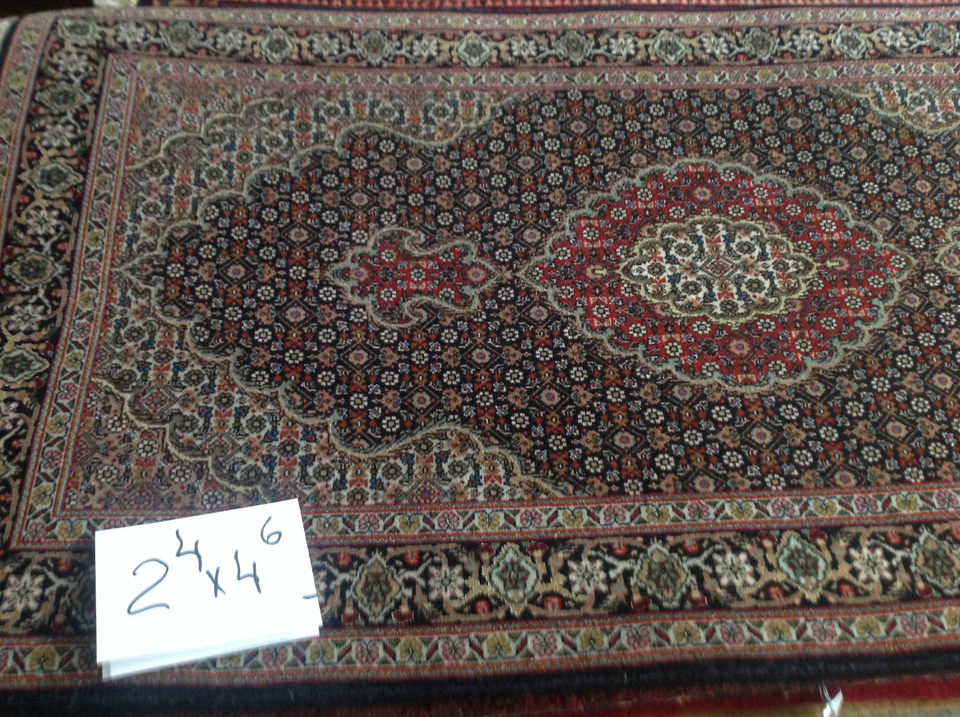 A rug with the number 24x4 on it