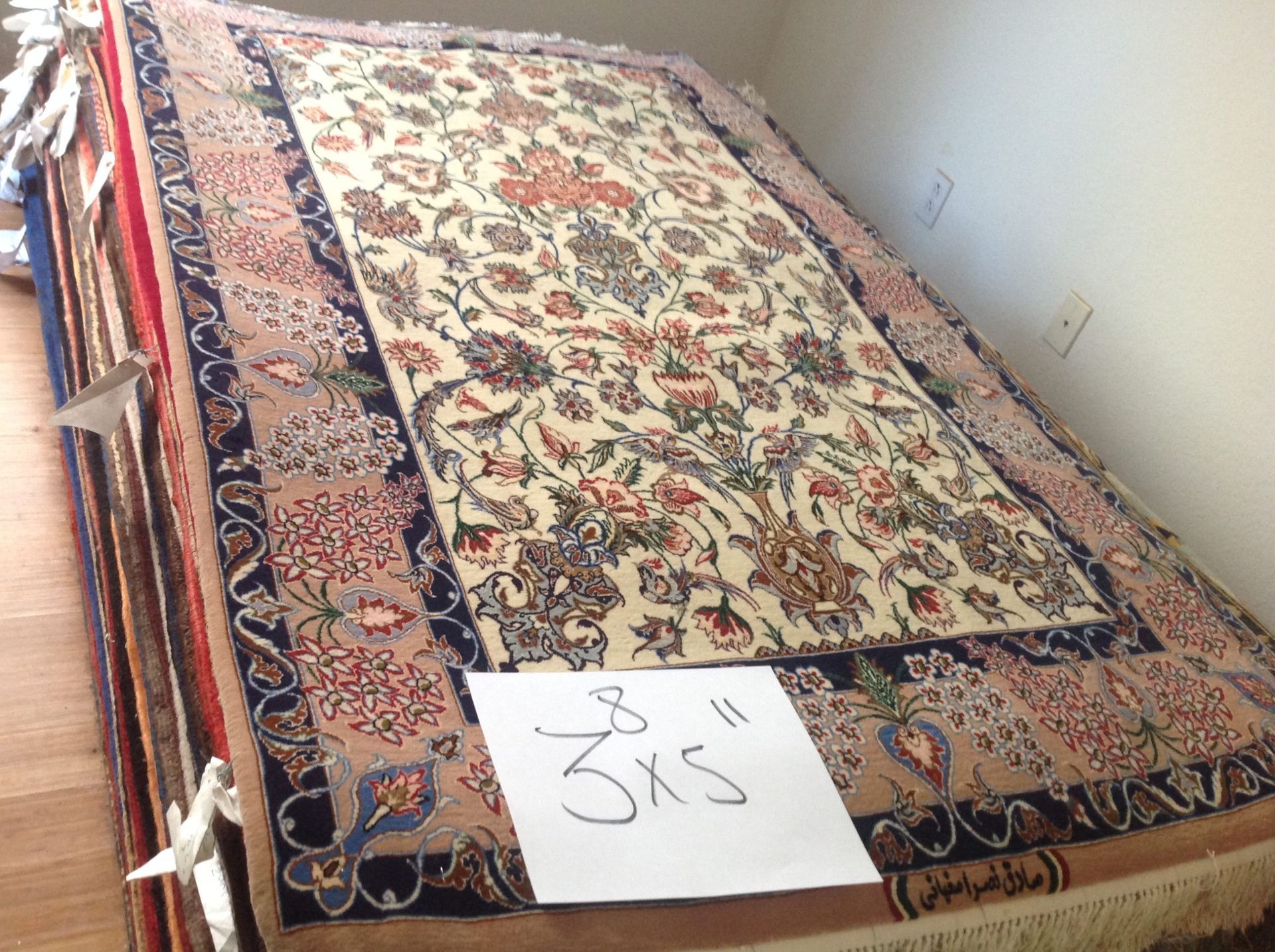 A rug with the number 3x5 on it