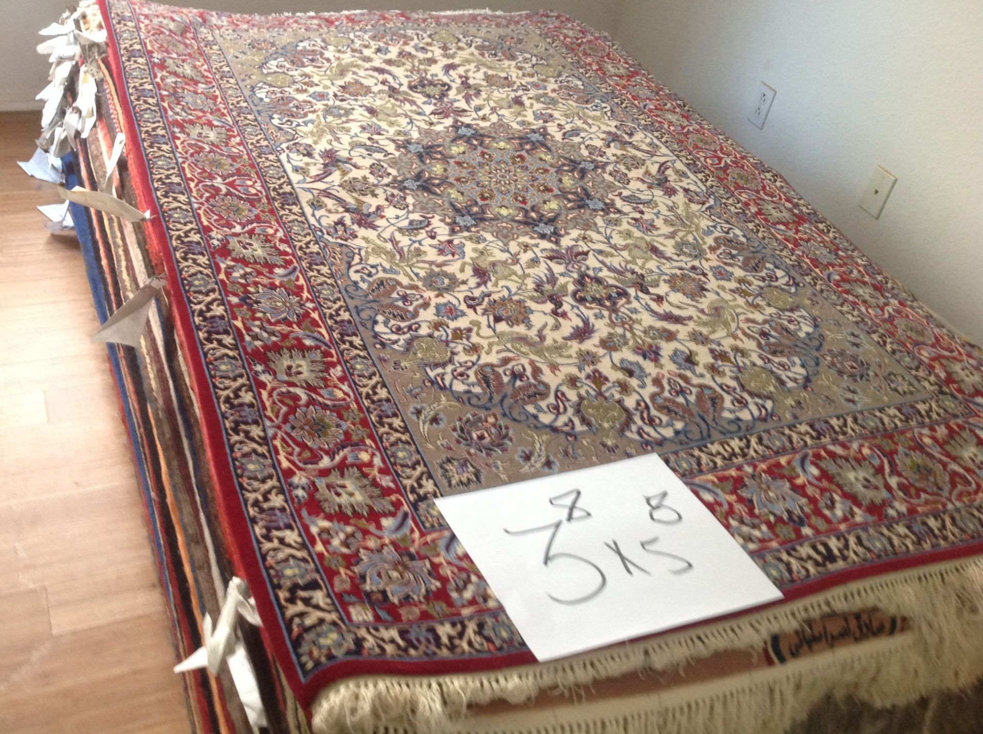 A rug with the number 5k8 on it