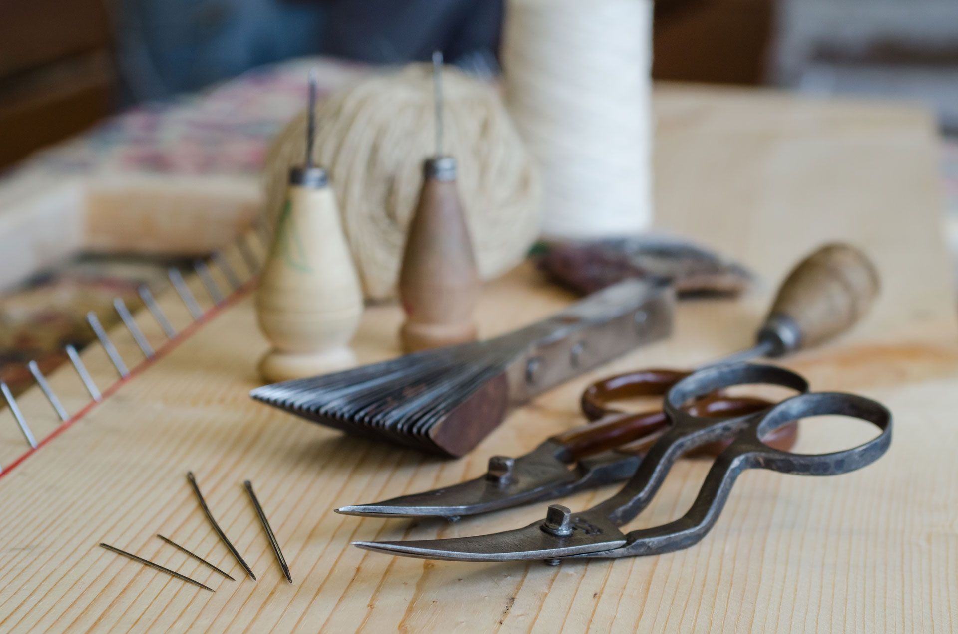 A wooden table with a bunch of tools on it
