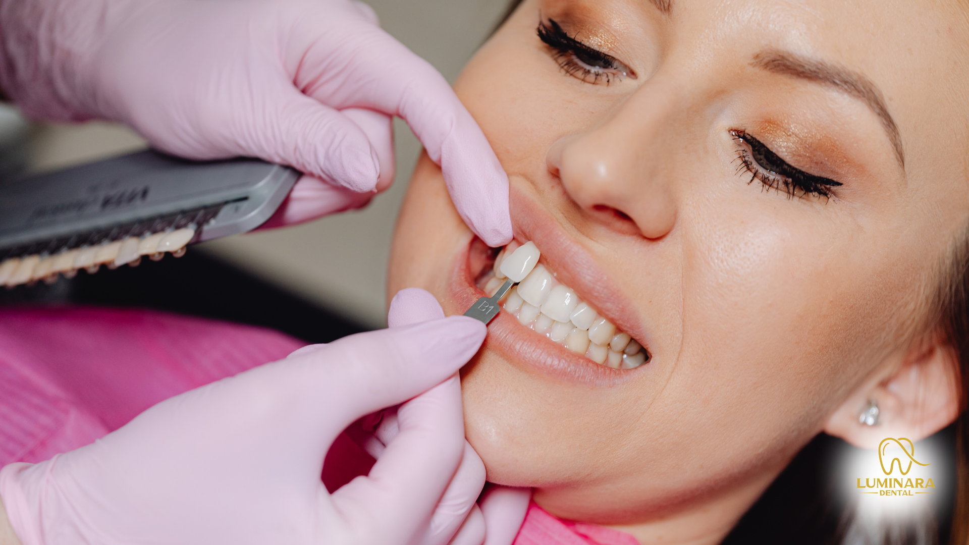 A woman is getting her teeth whitened by a dentist.