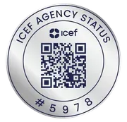 A silver circle with a qr code inside of it.