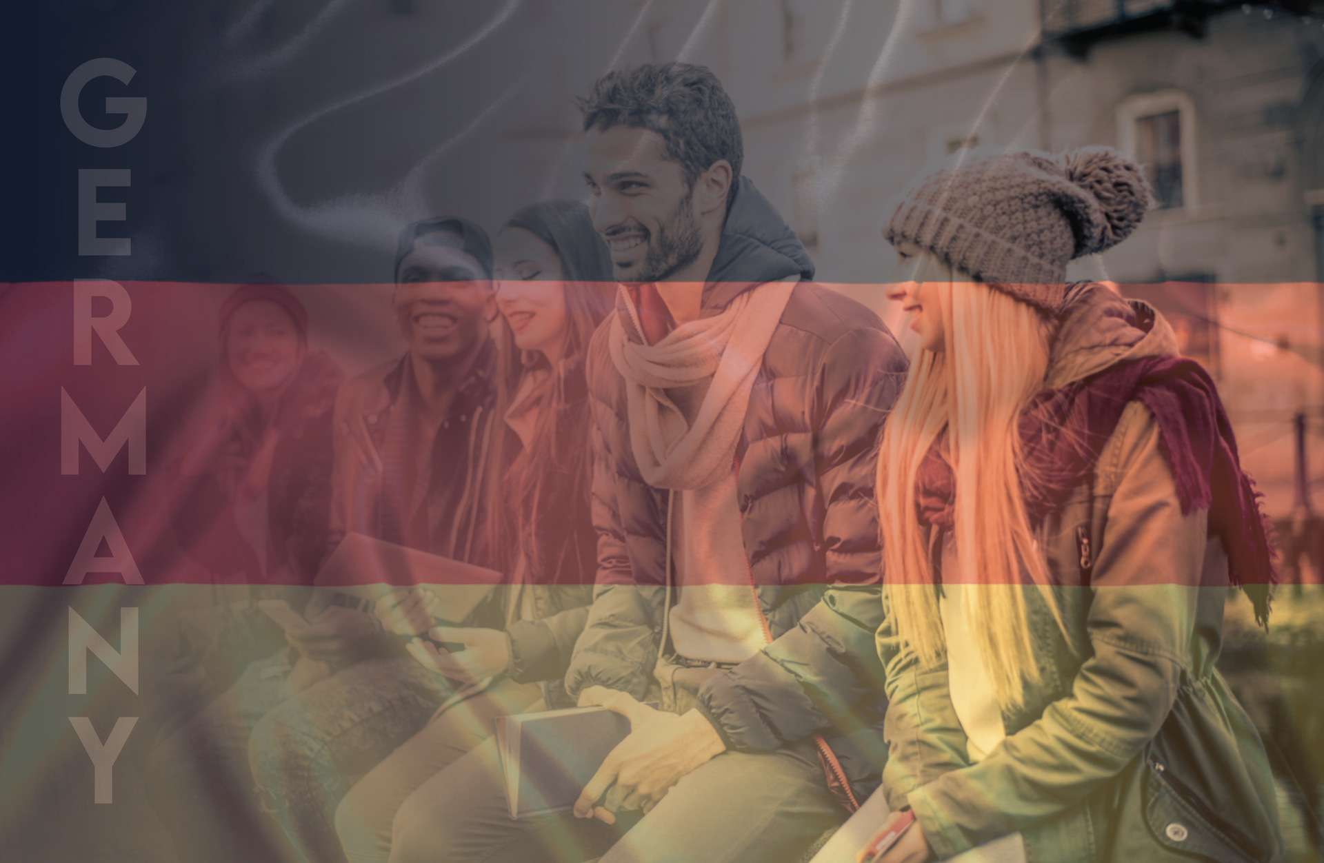 A group of people are sitting on a bench in front of a german flag.