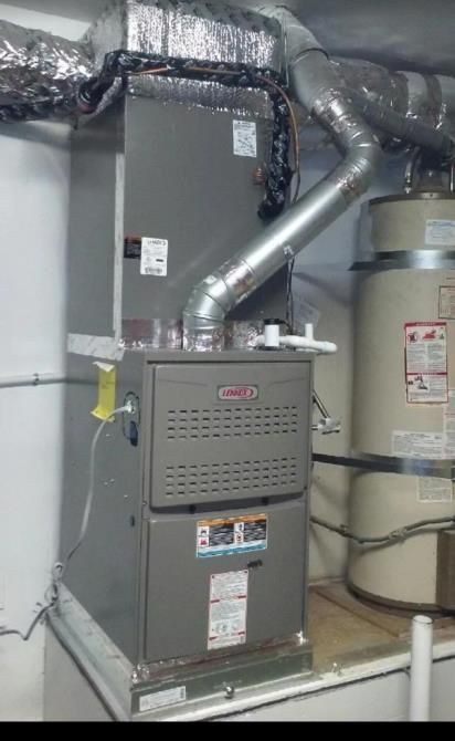 Diligent HVAC technician inspecting a residential AC unit for optimal performance and efficiency.