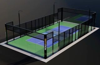 A man and a woman are playing pickleball on a court