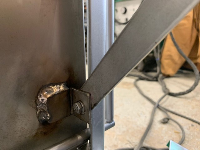 A close up of a metal object with a welding joint