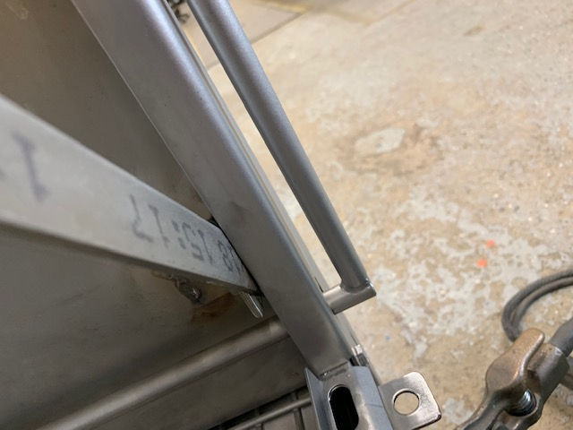A close up of a metal railing with the number 27 on it