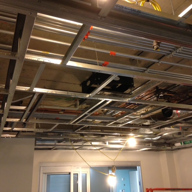 A room with a ceiling that is being remodeled