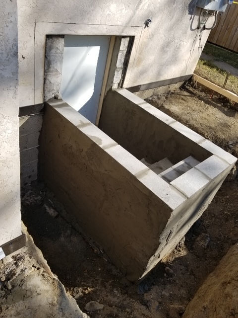 A window that is being built into a wall