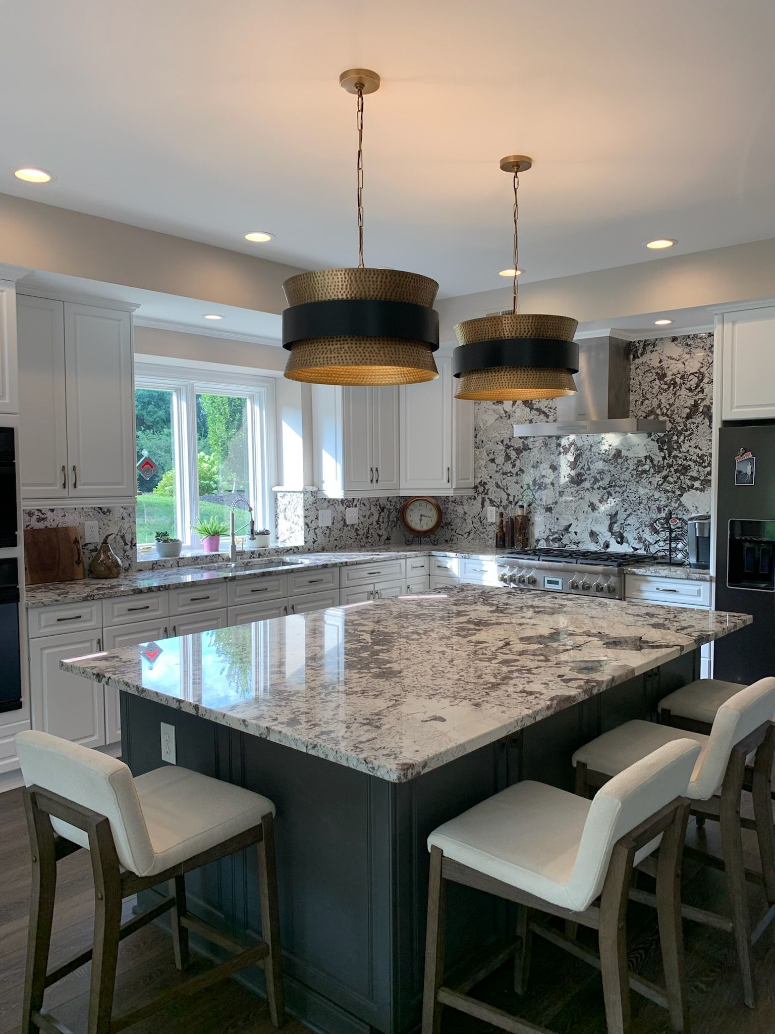 A house under construction with the number 77 on the side