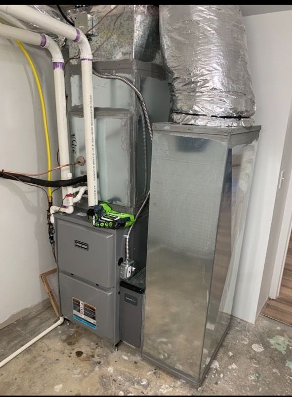 A picture of an air conditioner in a basement.