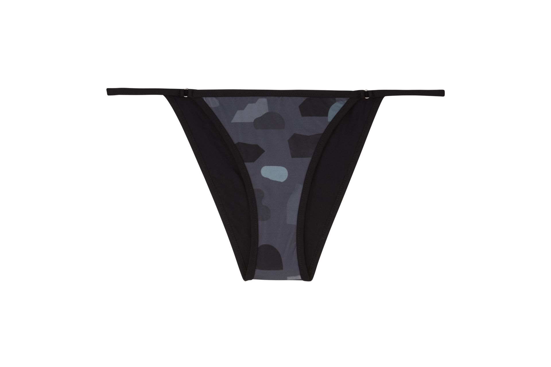 A pair of black thongs with a pattern on them on a white background.