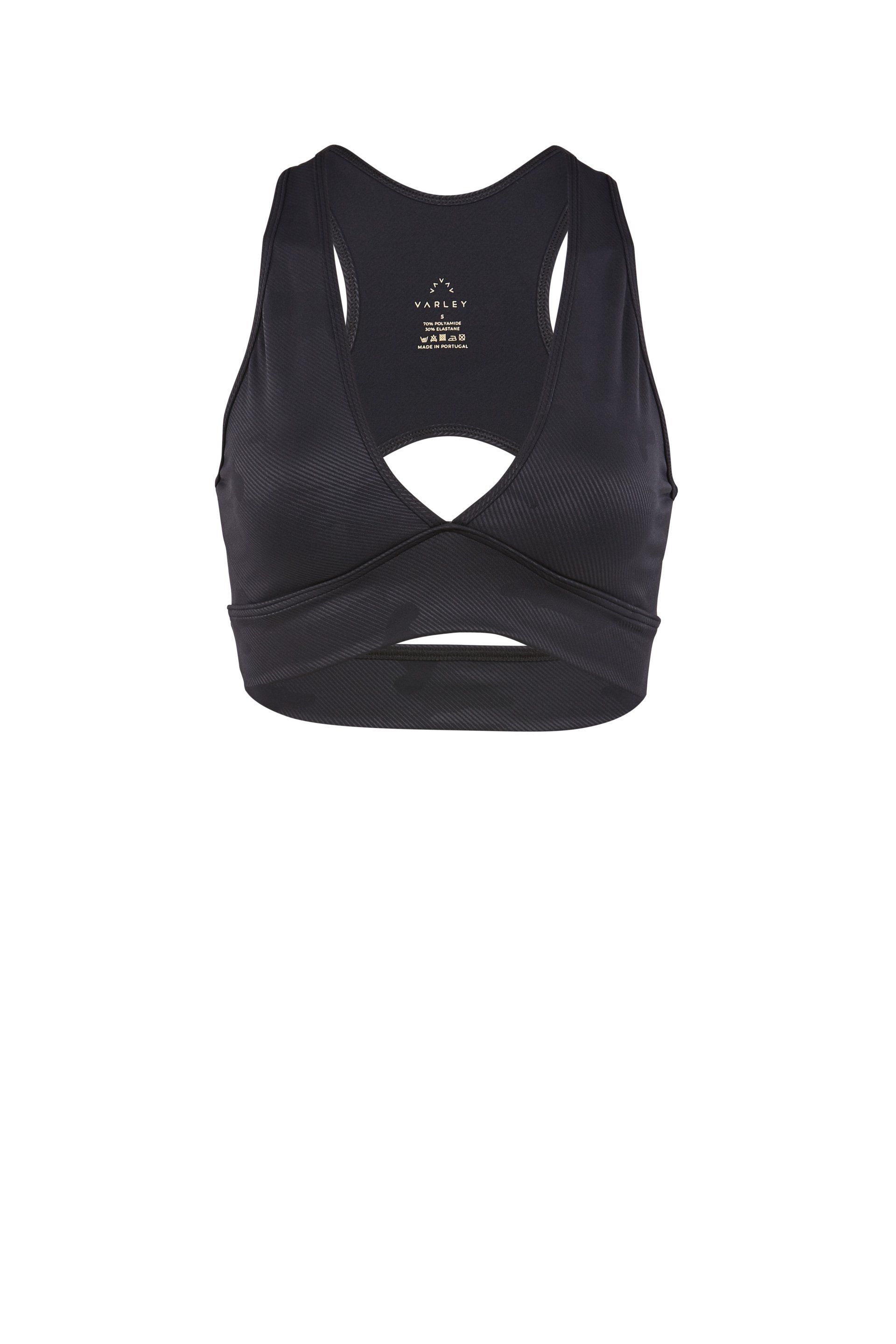 A black crop top with a hole in the middle on a white background.