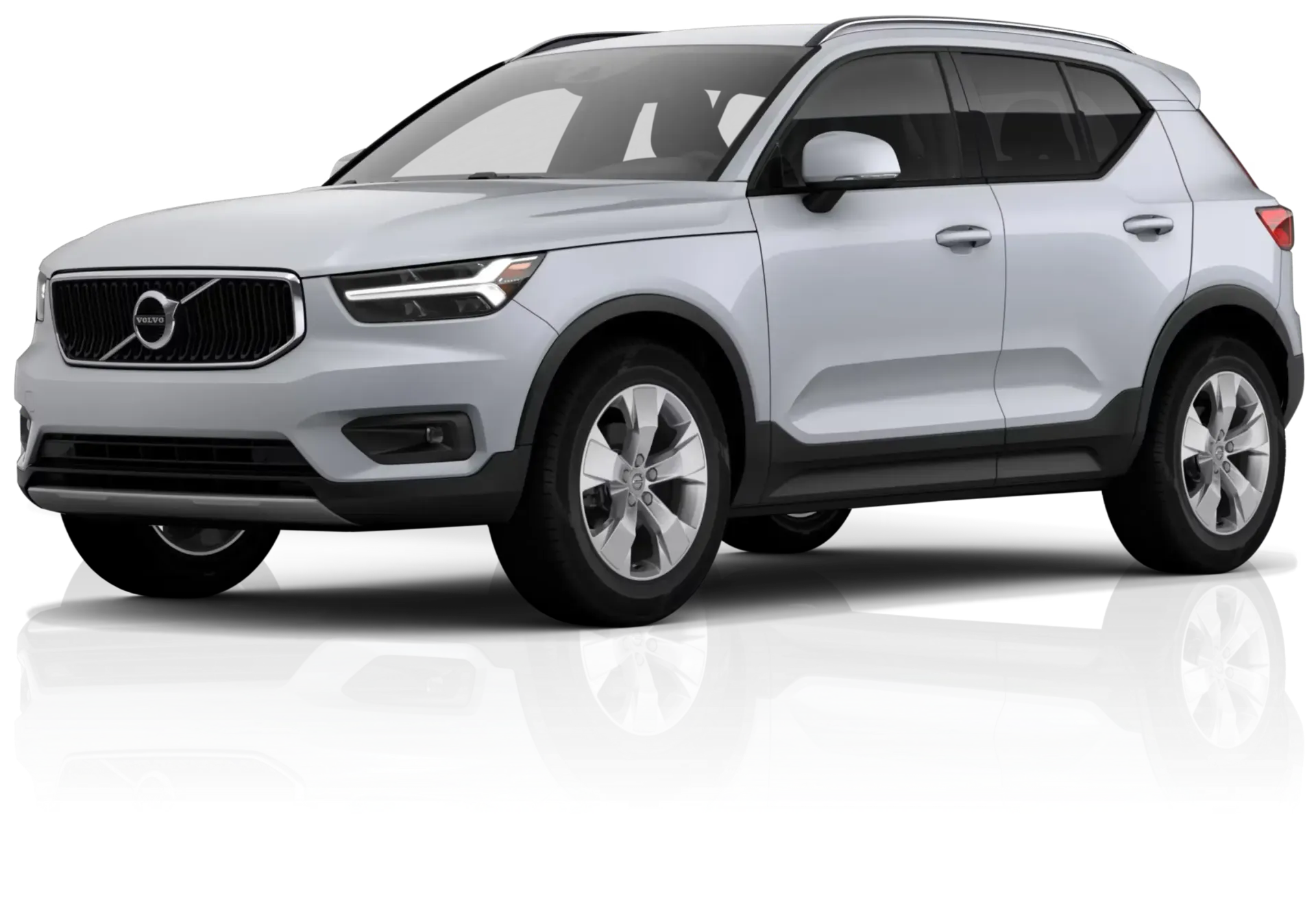 Um volvo xc40 branco está sobre uma superfície branca.