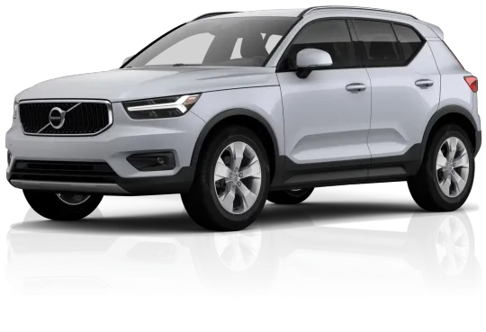 Um volvo xc40 branco está sobre uma superfície branca.