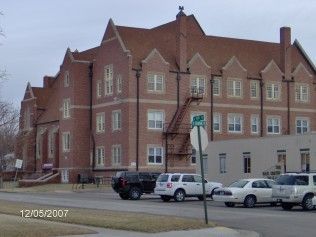 Red Big Building with Cars Outside — Casper and Glenrock, WY — Limmer Roofing