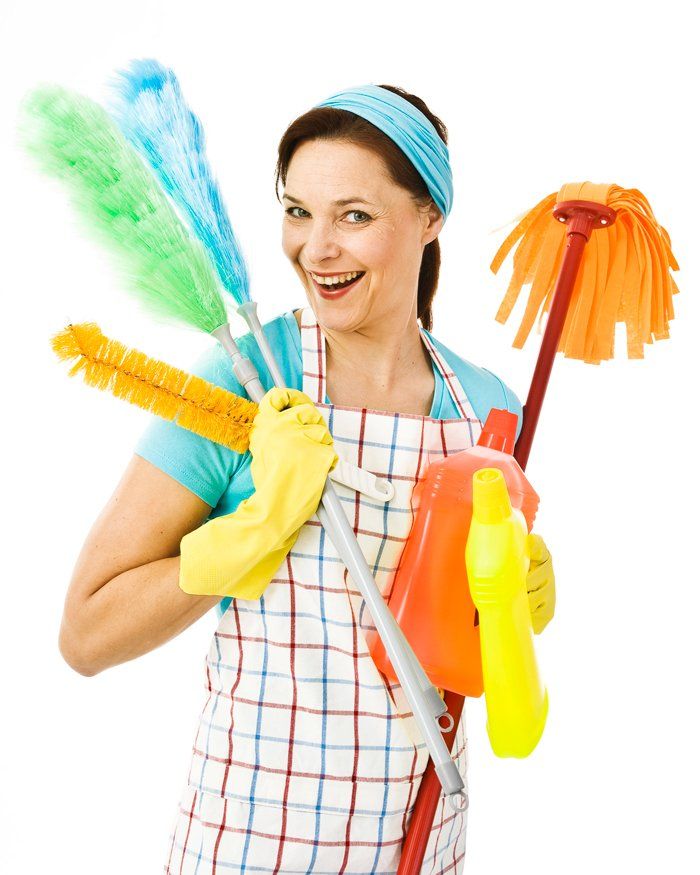 Woman Holding Cleaning Agents — Greenlawn, NY — The Cleaning Girls, Inc.