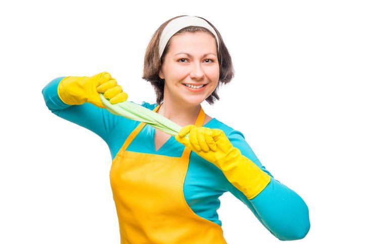 Woman With Green Rag of Microfiber — Greenlawn, NY — The Cleaning Girls, Inc.