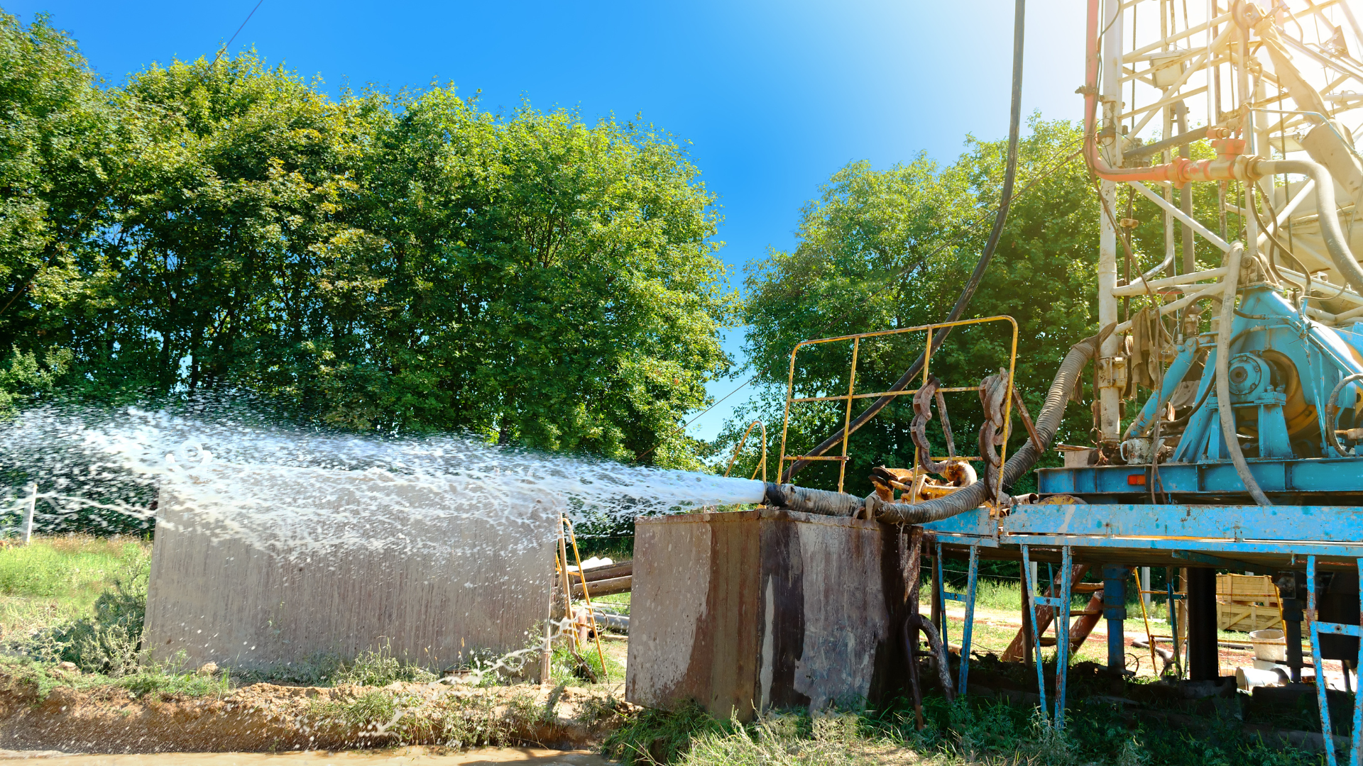 A close up of a machine drilling a hole in the ground.