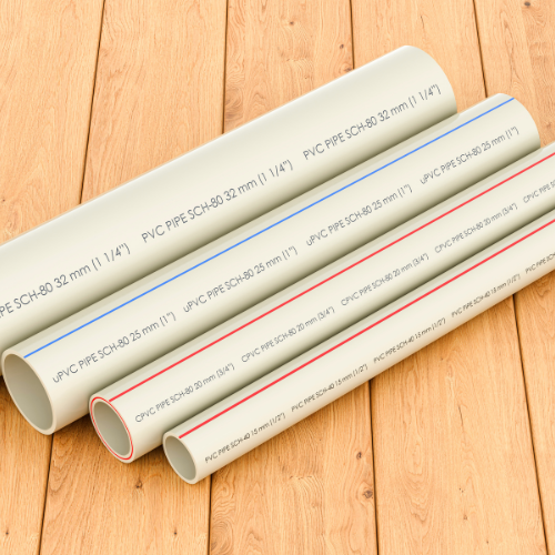 Plumber in black gloves and safety glasses repairing a water heater on a white wall.