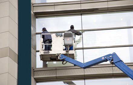 window washers on a hydraulic ramp