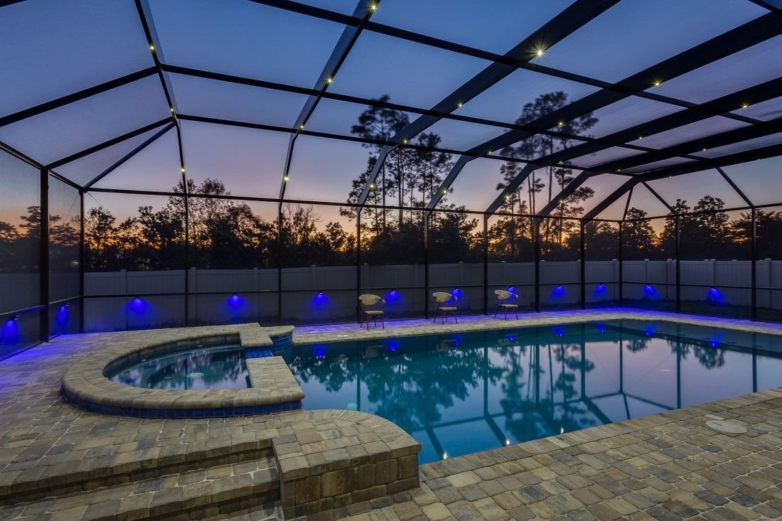 Beautiful Blue Lights On Around The Pool Area — Jacksonville, FL — Screen Enclosure Lighting, LLC