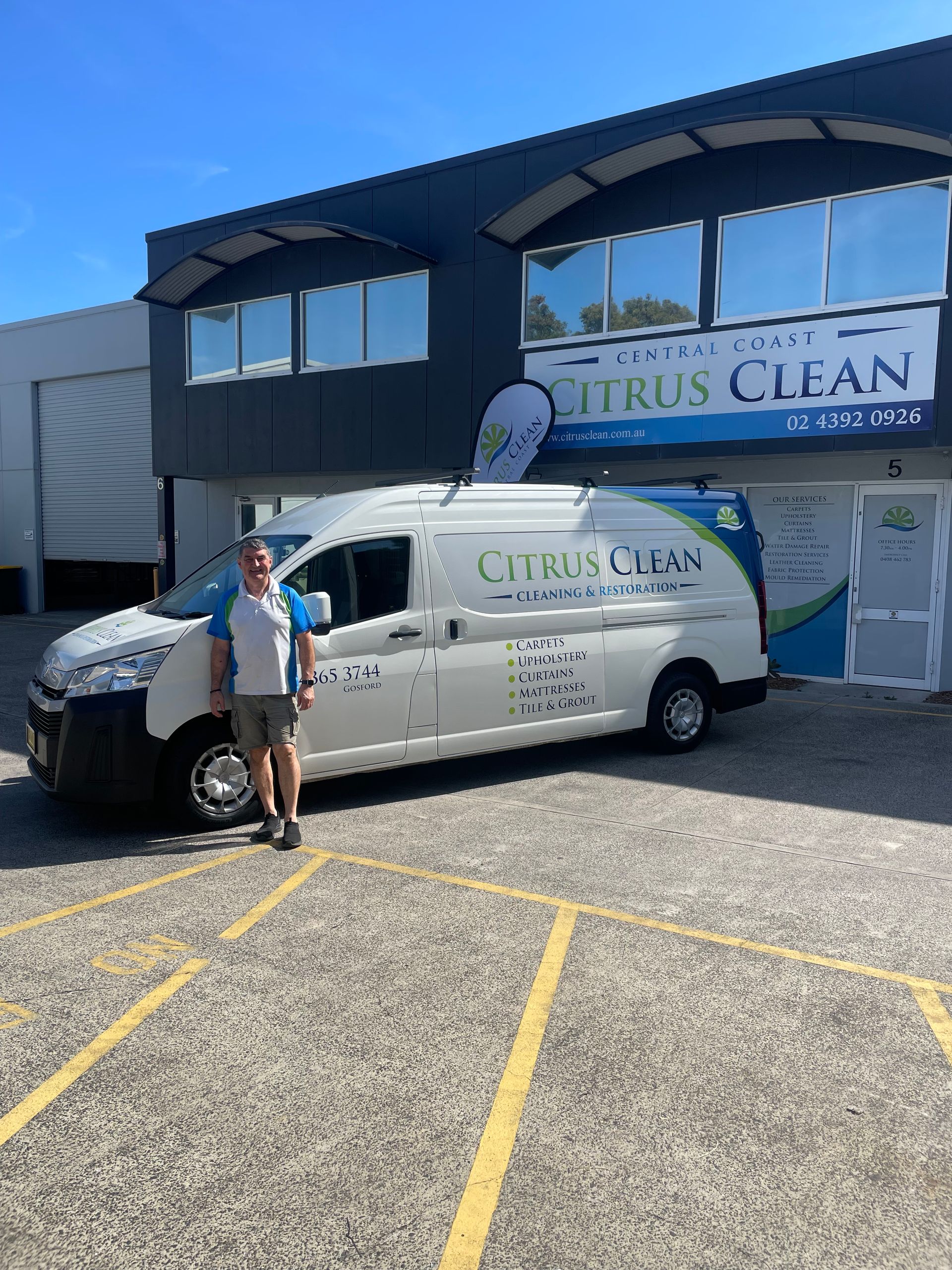 A Person Is Cleaning A Mattress With A Steam Cleaner — Citrus Clean Central Coast In Lake Haven, NSW
