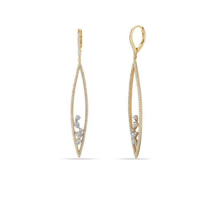 Gold teardrop earrings with small diamonds.