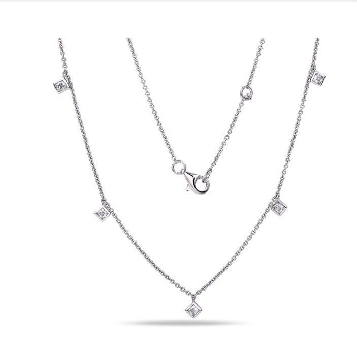Silver necklace with multiple square-shaped diamond pendants.