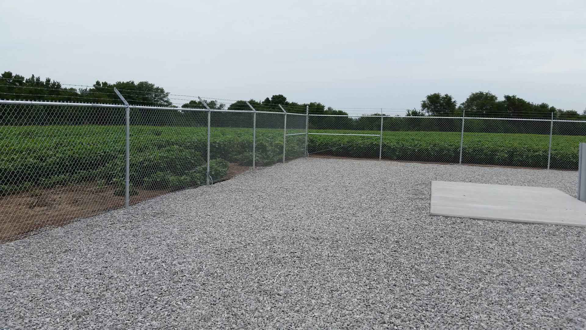 Chain Link Fence with Barbed Wire — Kansas City, KS — Allied Fence & Security