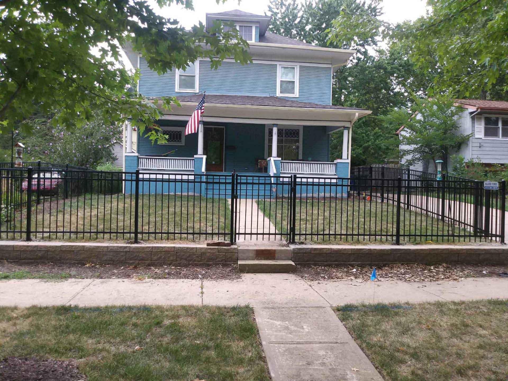 House with American Flag — Kansas City, KS — Allied Fence & Security