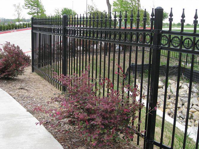 Wrought Iron Fence and Plants — Kansas City, KS — Allied Fence & Security