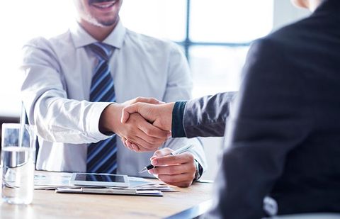 Insurance Agent and Client Handshake — Shrub Oak, NY — Girolamo Insurance Agency