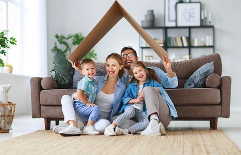 Happy Family at Home — Shrub Oak, NY — Girolamo Insurance Agency