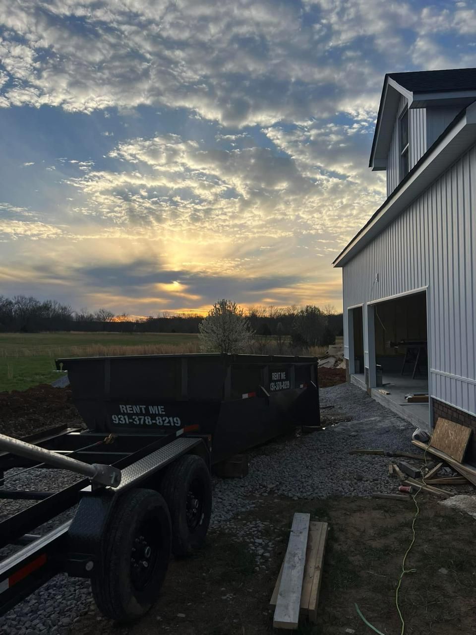 Homeowner using Mid-Tenn Dumpster for yard waste removal and landscaping cleanup in Manchester TN