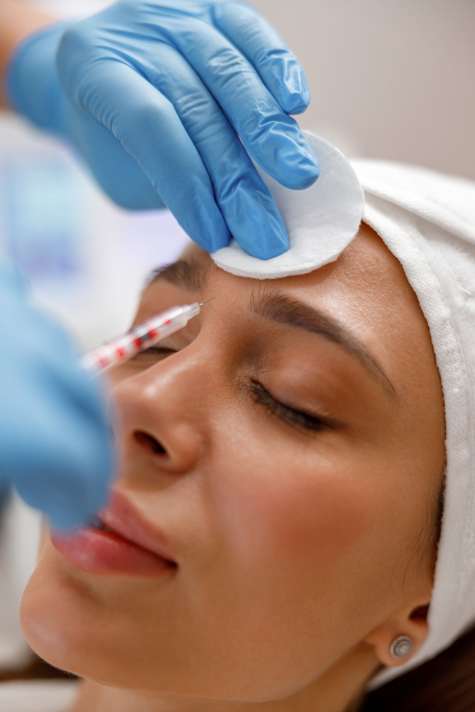 closeup of female getting botox injections