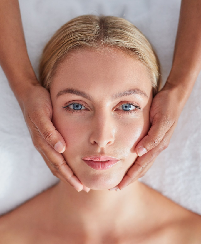 woman receiving a face massage