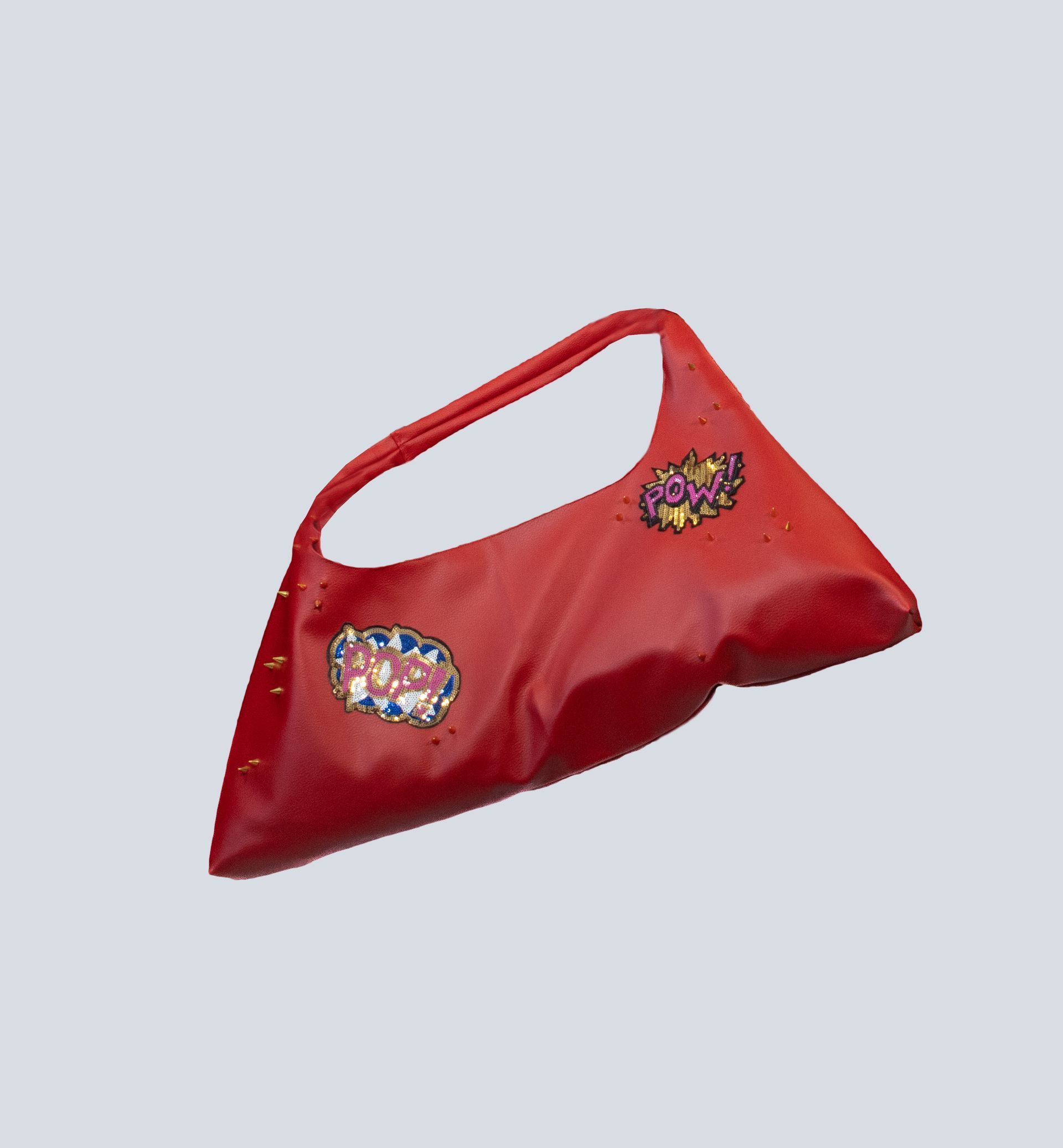A red purse with two hearts on it on a white background.