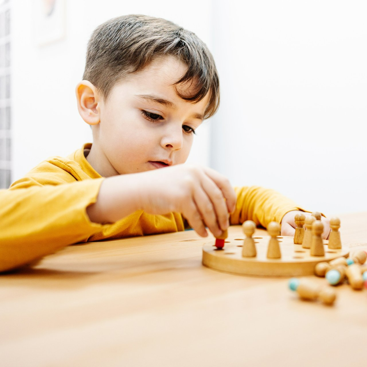 Little Boy Playing Board Game on Educational Theraphy - Little Falls, MN - Center For Family Counseling