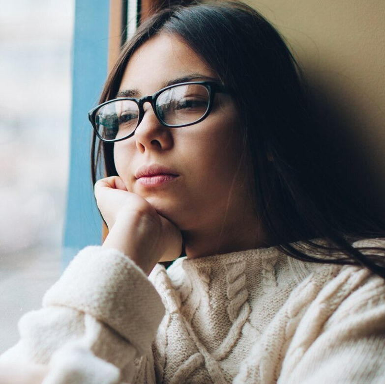 Thinking while Sitting Beside the Window - Little Falls, MN - Center For Family Counseling