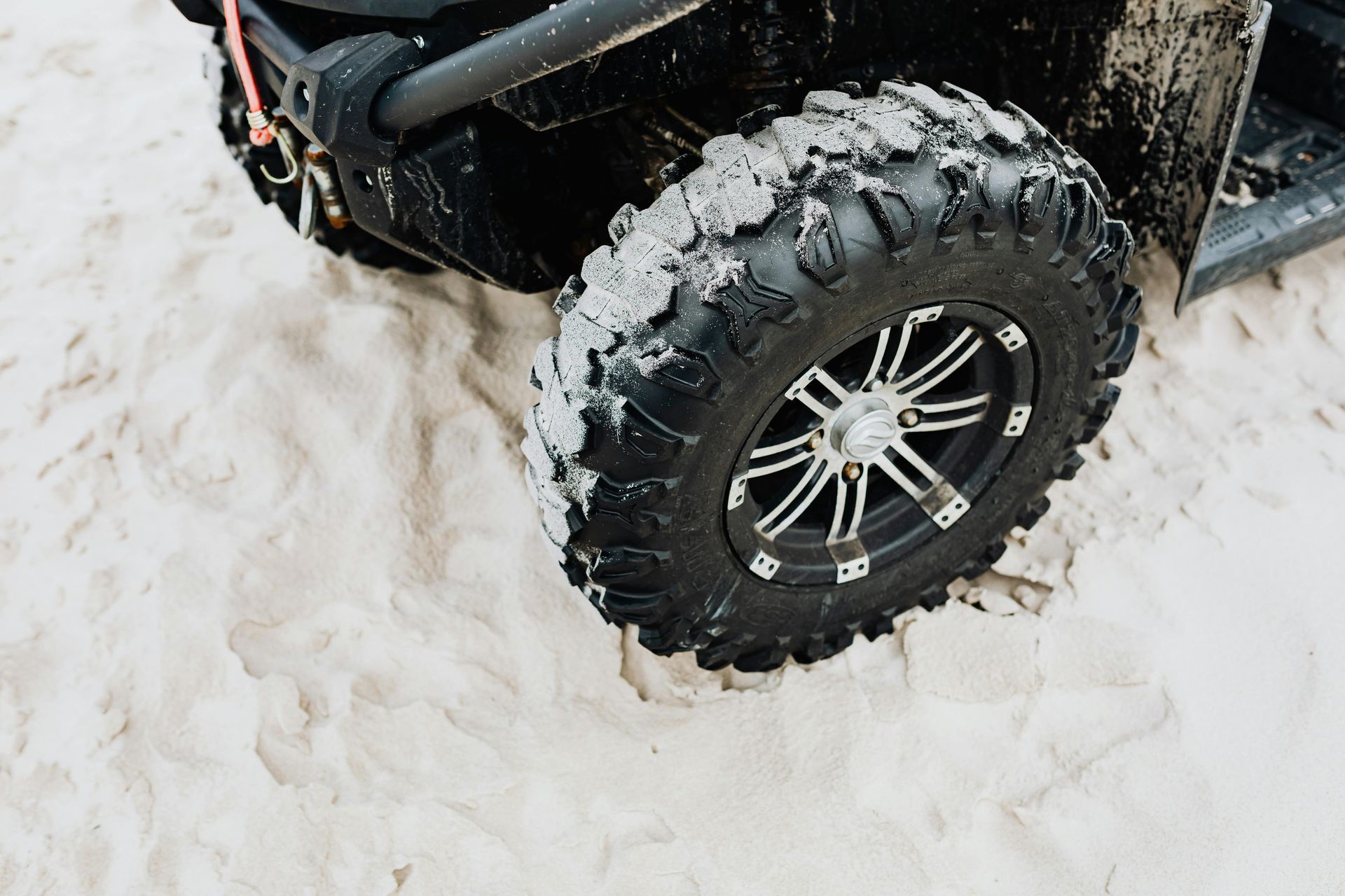 atv tire in sand