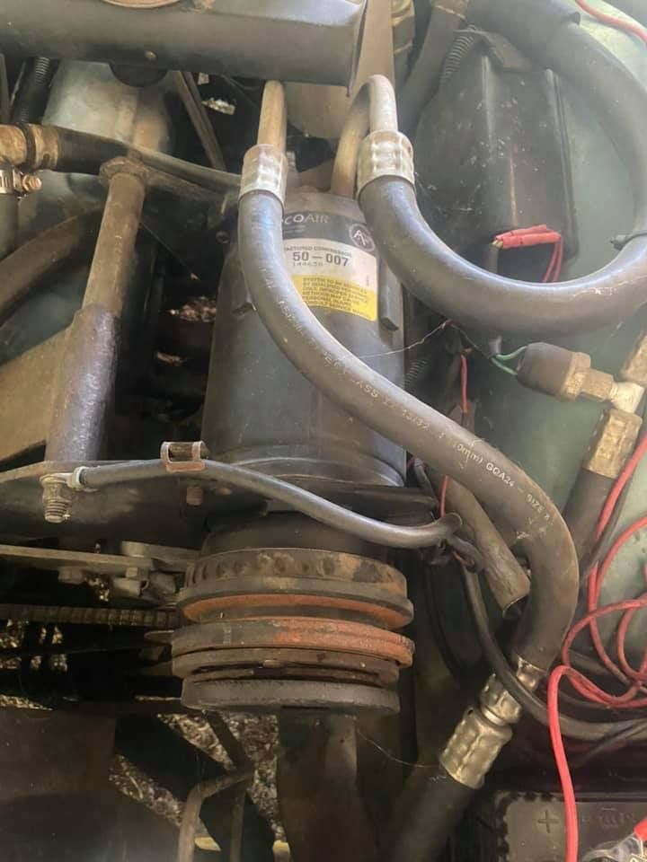 A Close-up of a Hose Connected to a Motor in a Car — Auto Electrician Armidale