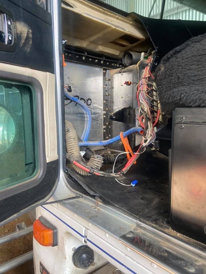 A Truck with the Door Open and a Bunch of Wires Coming Out of it — Auto Electrician Gunnedah